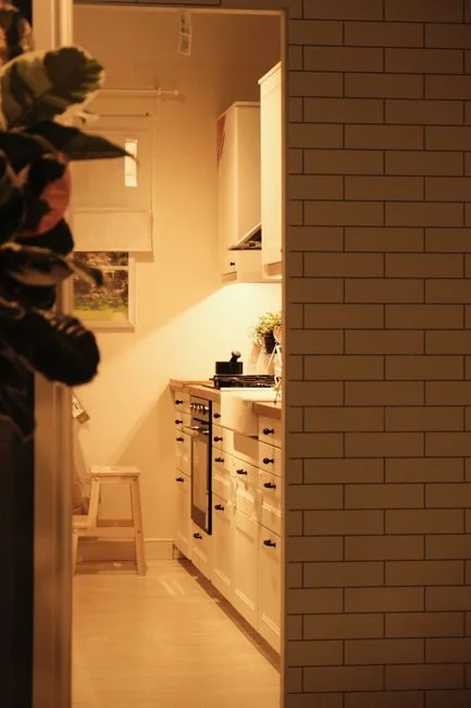 A person in full protective gear fumigating a room to ensure sterilization against viruses.